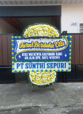 Papan Bunga Duka di Bandar Buat