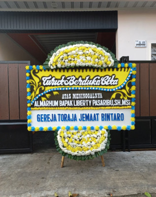 Papan Bunga Duka di Bandar Buat