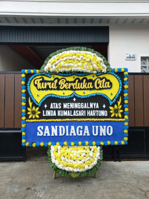 Papan Bunga Duka di Bandar Buat