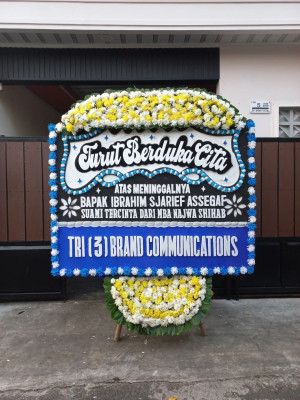 Papan Bunga Duka di Bandar Buat